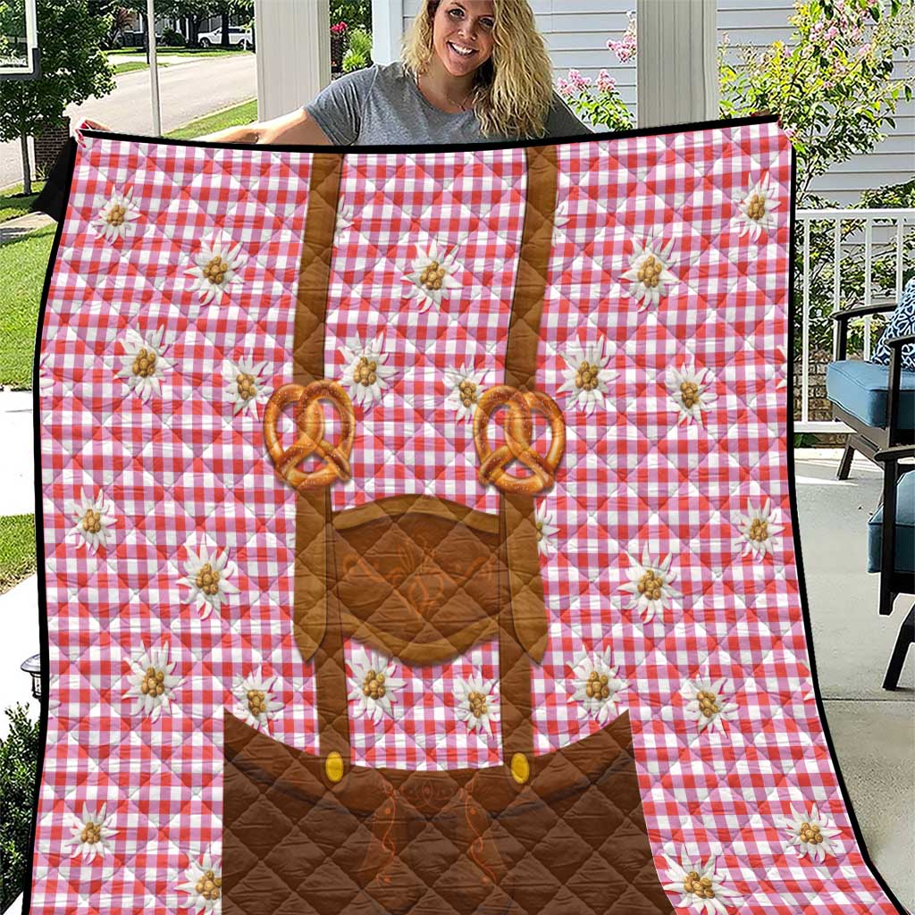Lederhosen quilt with red plaid, pretzels, and edelweiss flowers