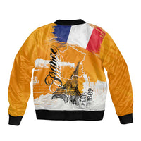 Orange bomber jacket with back graphic print, front zipper, ribbed hem and cuffs