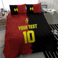 Red and black football bedding set with two shams and yellow number 10 on duvet