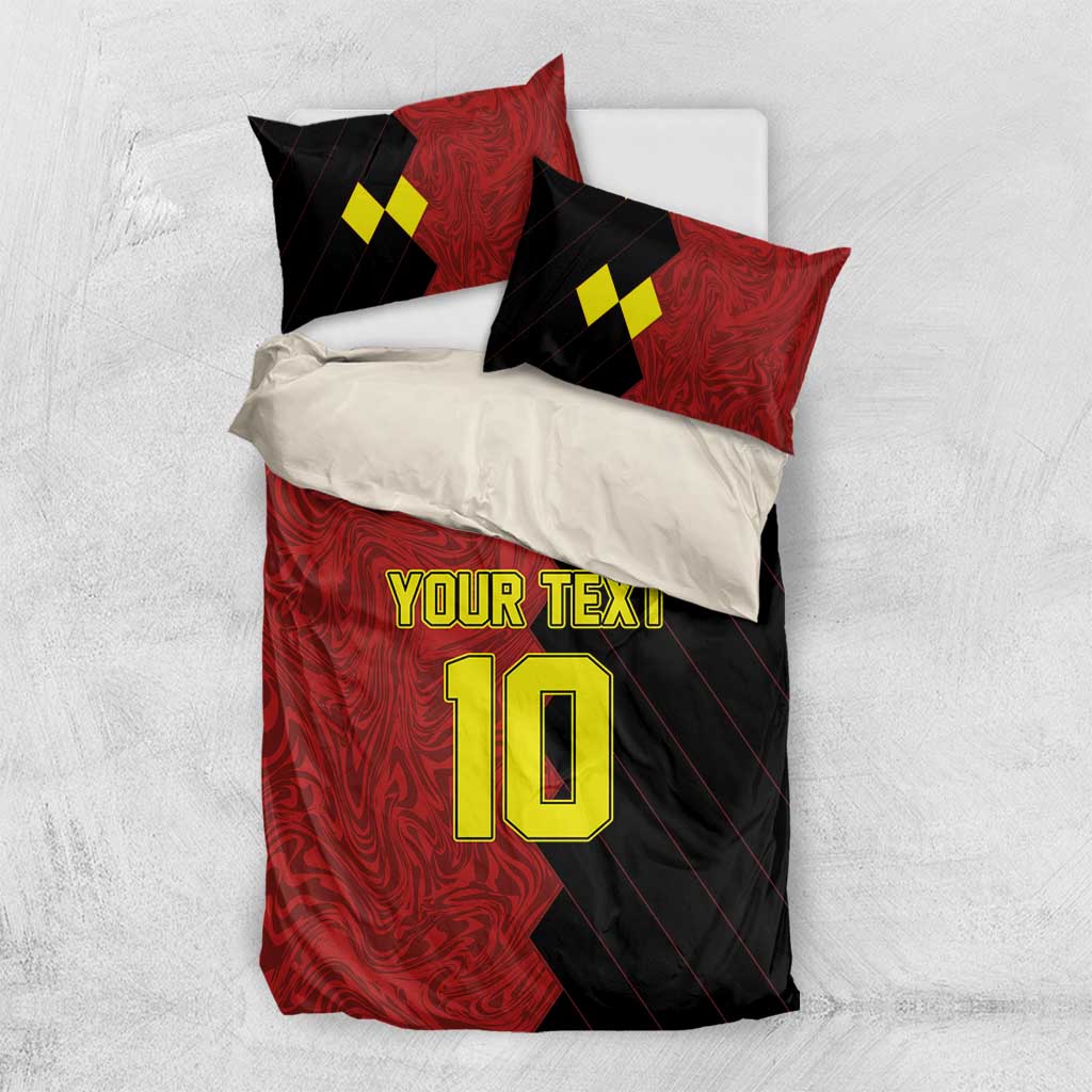 Red and black bedding set on white surface with number 10 graphic and pillow shams