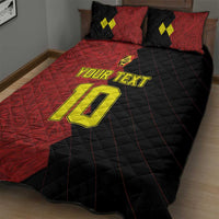 Red/black quilt bed set with yellow 'YOUR TEXT' and large '10', on bed with pillows
