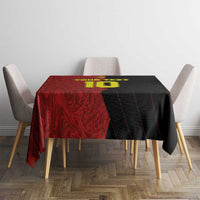 Red and black football tablecloth with yellow graphic on table top