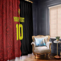 Red custom window curtain with printed text and large number overlay, full-height hanging