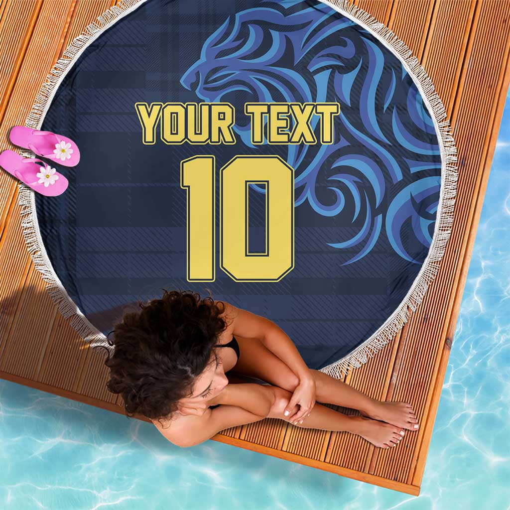 Angled blue round beach blanket with white fringe; gold Your Text and number 10