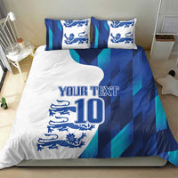 Blue and teal striped bedding set with lion crest, 'YOUR TEXT' and number 10, on a bed