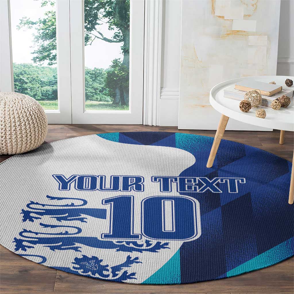 Round blue carpet with 'YOUR TEXT' and '10' design, white-and-blue crest