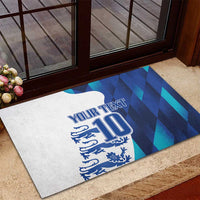 Blue rubber doormat outdoors with “YOUR TEXT” and number 10 crest design