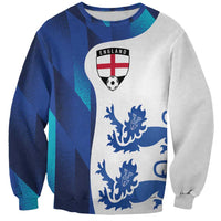 Unisex sweatshirt with blue-and-gray panels and England crest soccer graphic on front