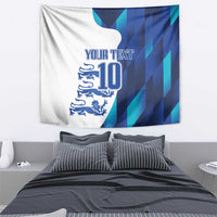 Blue-and-white tapestry showing 'YOUR TEXT', number 10, and lion/crest emblem