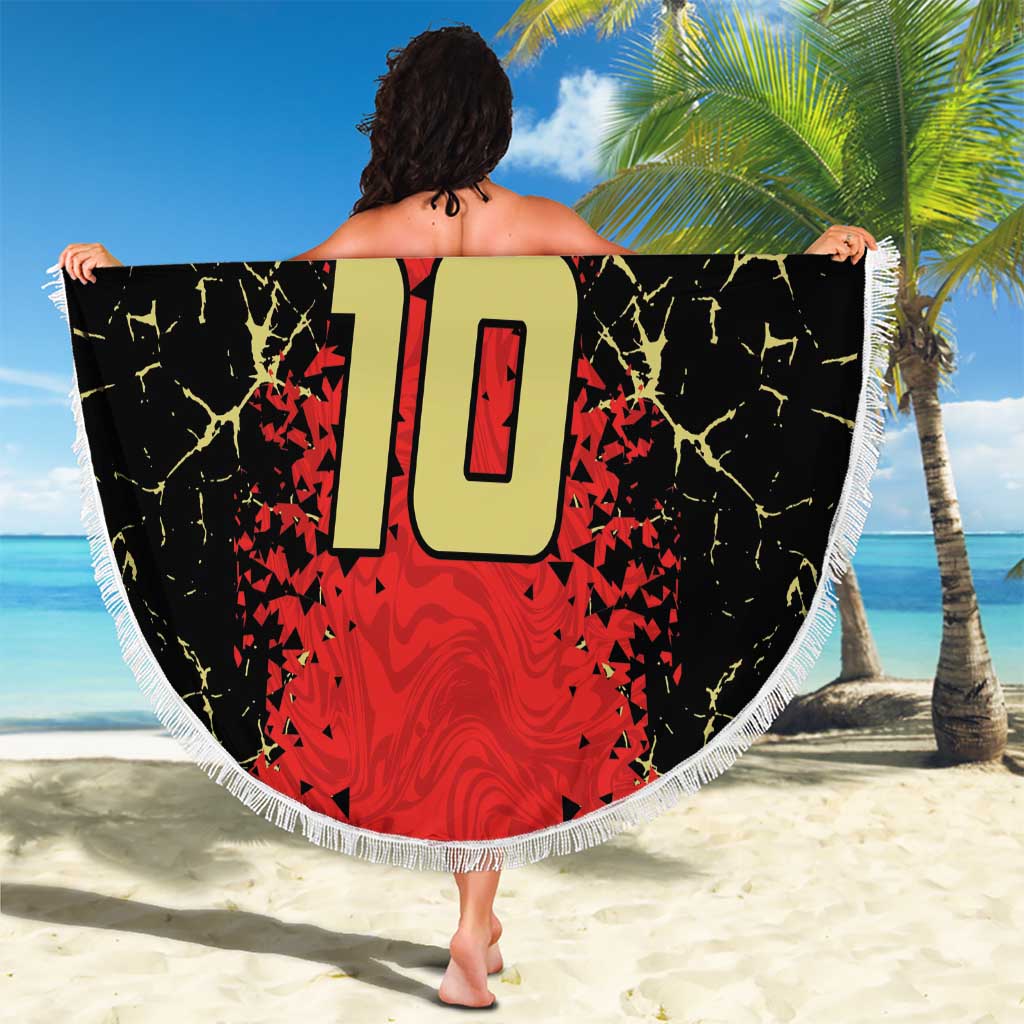 Round beach blanket featuring Albania-style crest and large “10” on red and black design