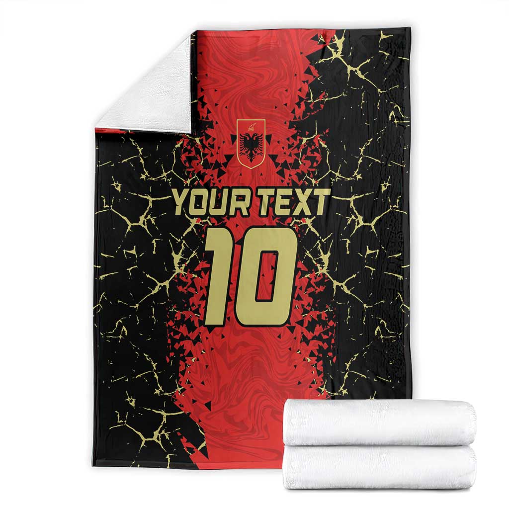 Black and red custom football blanket with shield crest and 10 graphic, folded stacks