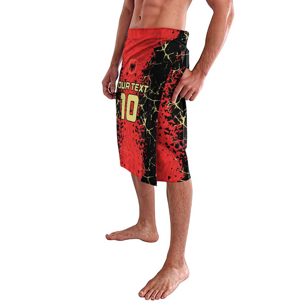 Men's red and black graphic football shorts, angled side view with number print
