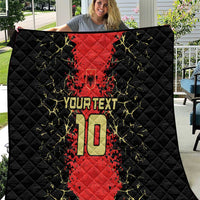 Quilt blanket close view: black and red football jersey graphic with number 10 and “YOUR TEXT”.