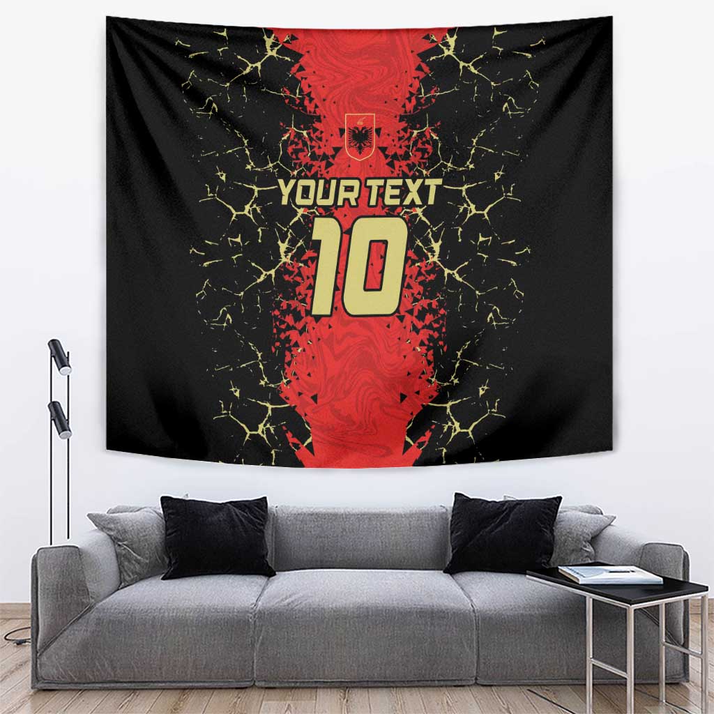 Football tapestry featuring a red crest and number 10 on black fabric with yellow crack pattern