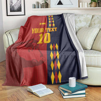 Custom Spain football blanket with red and navy panels, lion graphic, and diamond stripe side
