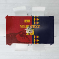 Red and navy Spain-themed tablecloth with geometric pattern and crest design.