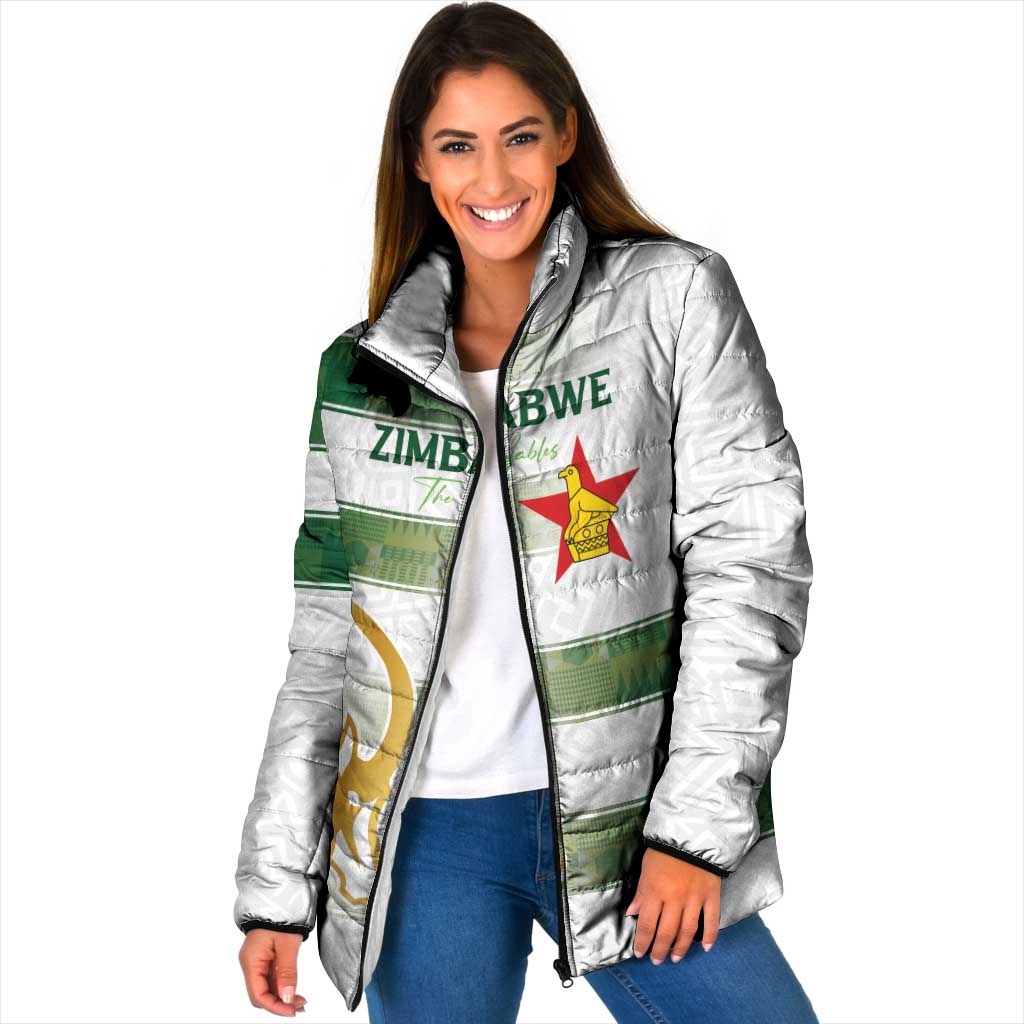 White padded rugby jacket with green-and-gold Zimbabwe crest, zip front, hood