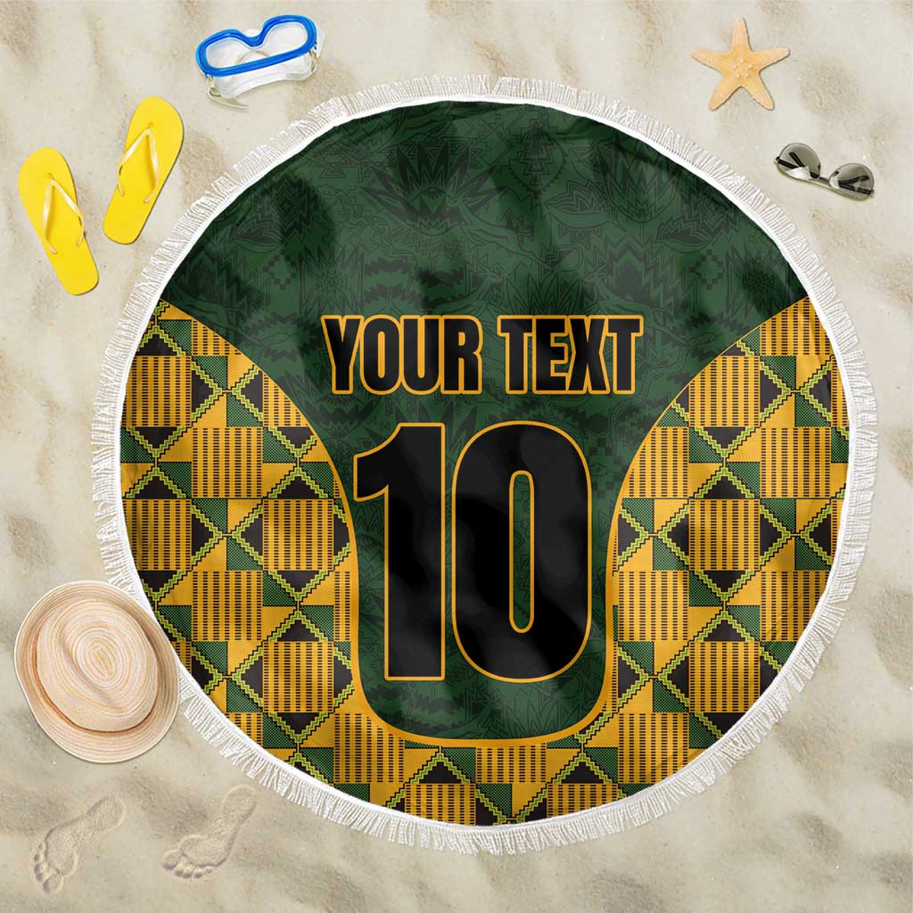 Round green beach blanket with fringe, yellow kente pattern, “YOUR TEXT” and number 10