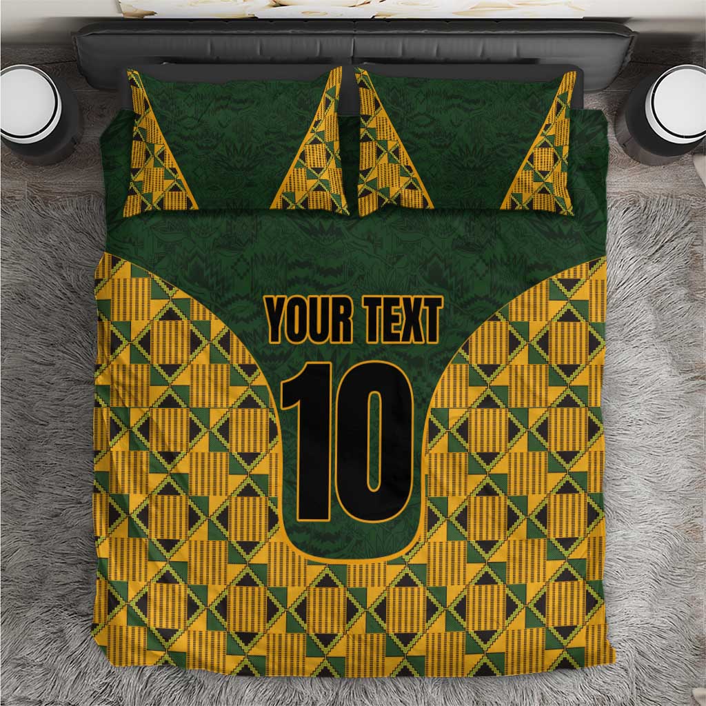 Green bedding set with kente triangles, 'YOUR TEXT' and number 10.