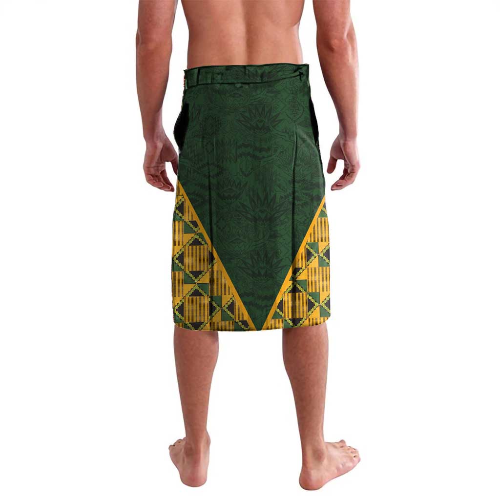 Green elastic-waist shorts with yellow kente-pattern side panel