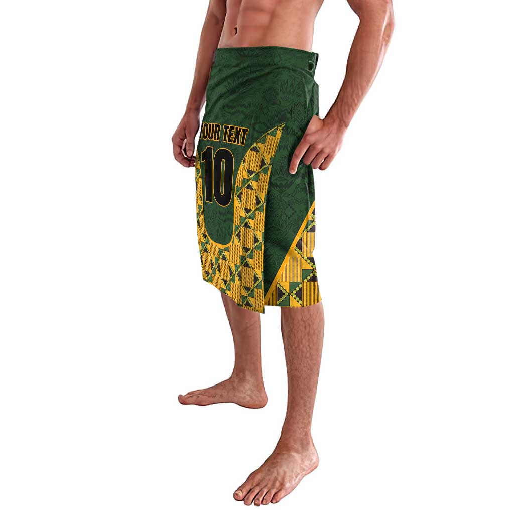 Green elastic-waist shorts with yellow kente geometric print and number 10 front