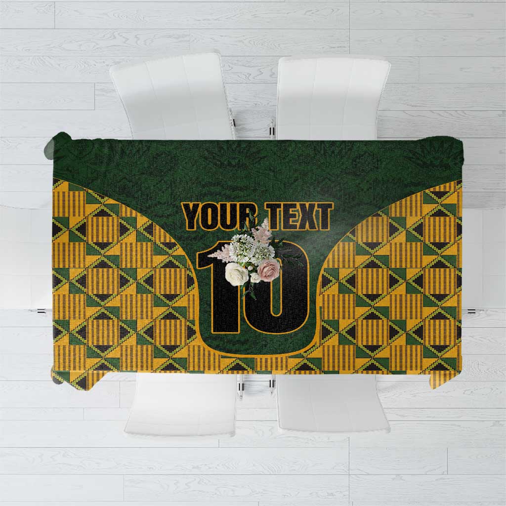 Green kente-style tablecloth with yellow geometric pattern and custom text area “YOUR TEXT” 10