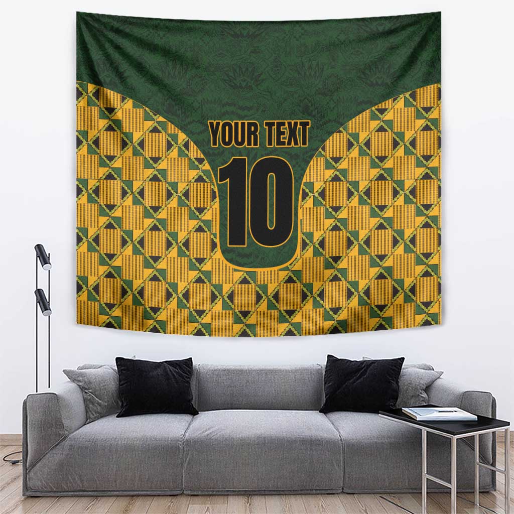 Green and yellow kente-pattern tapestry with 'YOUR TEXT' and a large gold '10'.