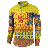 Yellow button henley sweatshirt, long sleeves, red crest and blue festive motifs