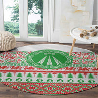 Round Christmas carpet with green tree emblem and red/green geometric border patterns