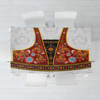 Red rosemaling folk art tablecloth with colorful floral band and gray damask base