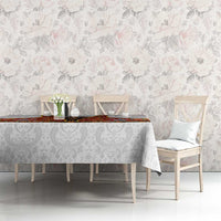 Gray damask tablecloth with red rosemaling runner and colorful floral accents