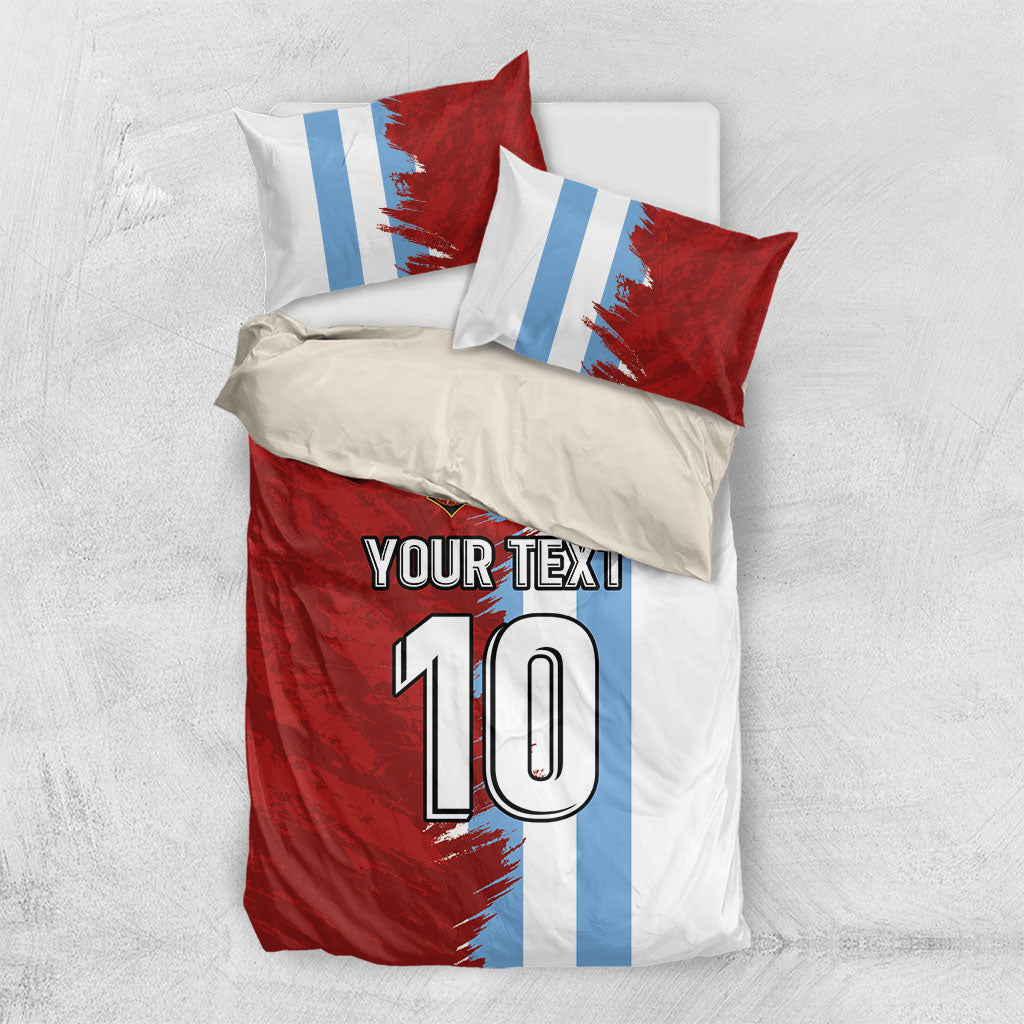 Football bedding set with two pillows and duvet in red, white, and light-blue, '10' graphic
