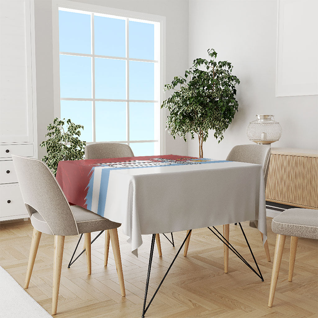 Football tablecloth with half red grunge and blue center stripes on light grey