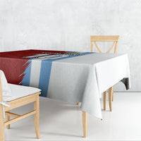 Half red and blue grunge football tablecloth with grey right half and white draped edge