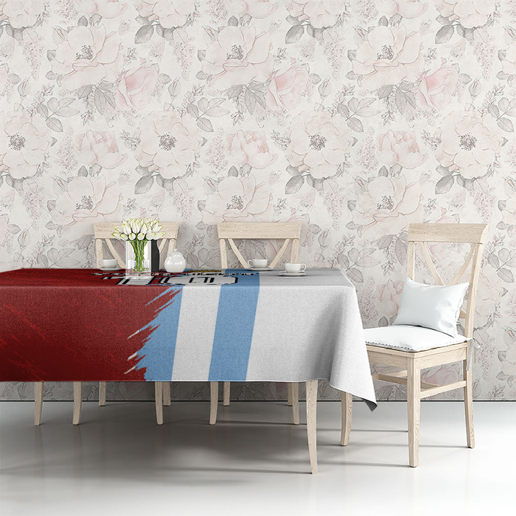 Half red grunge football tablecloth with vertical blue stripes and grey right side