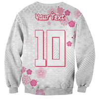 Gray sweatshirt with large red number '10' print and pink flowers, long sleeves