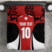 Red and black bedding set with maple leaf pattern, number 10 and 'YOUR TEXT'.