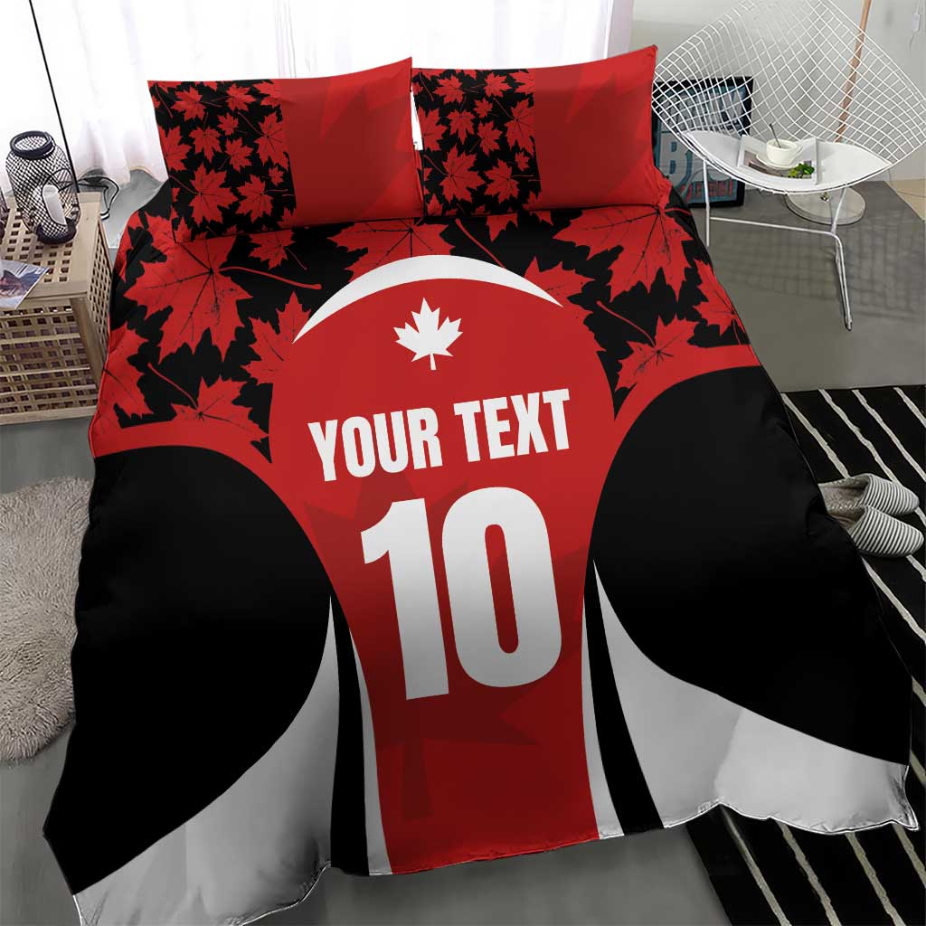 Red and black bedding set with maple leaf motif, 'YOUR TEXT' and number 10.