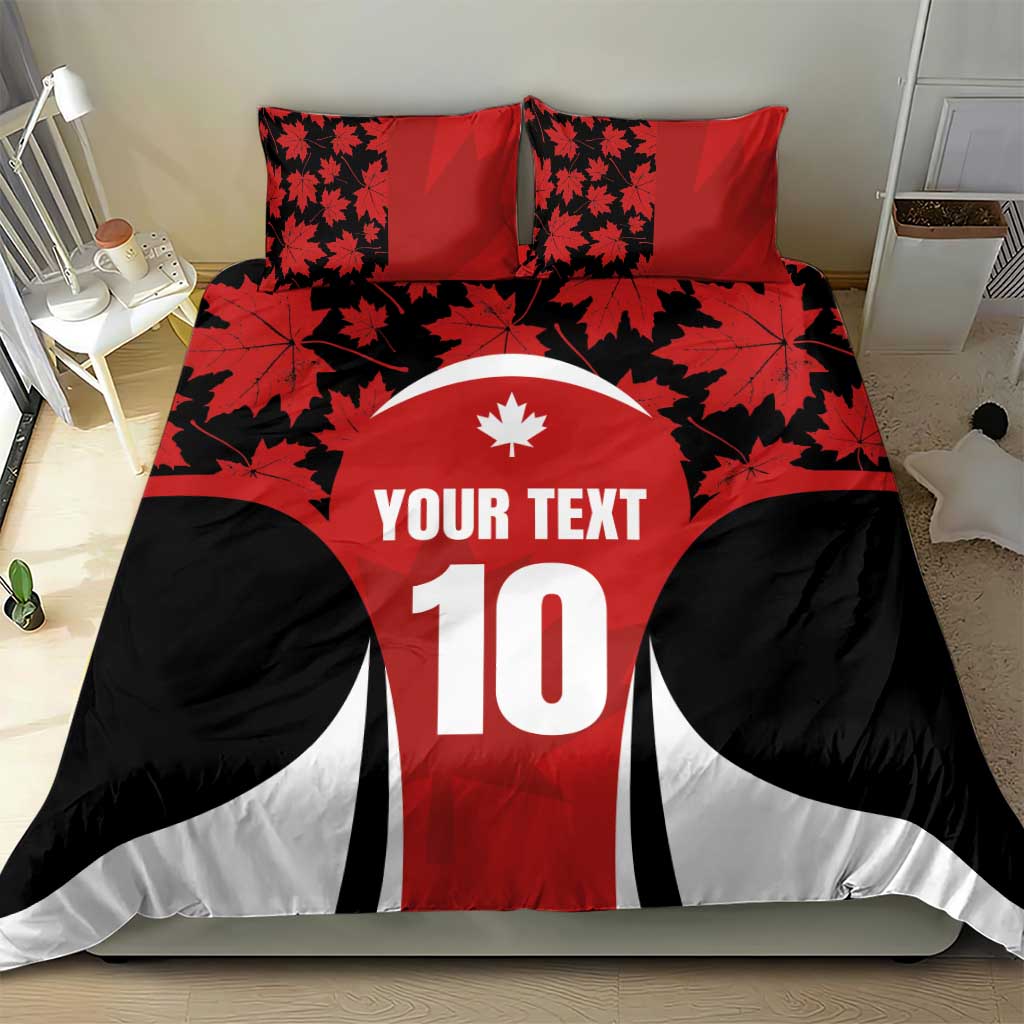 Red and black duvet set with maple leaves on pillow covers, number 10 and 'YOUR TEXT'.