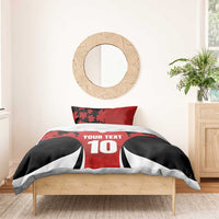 Red and black duvet set with maple leaf pattern, centered 'YOUR TEXT' and number 10.