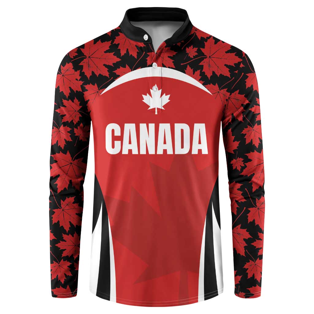 Red button rugby sweatshirt with black maple leaf pattern and Canada crest on chest