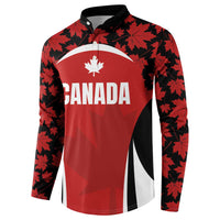 Red button rugby sweatshirt with Canada lettering and black maple leaf sleeve pattern