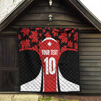 Canada-themed quilt blanket hanging on a wall, red maple leaves, custom text, number 10