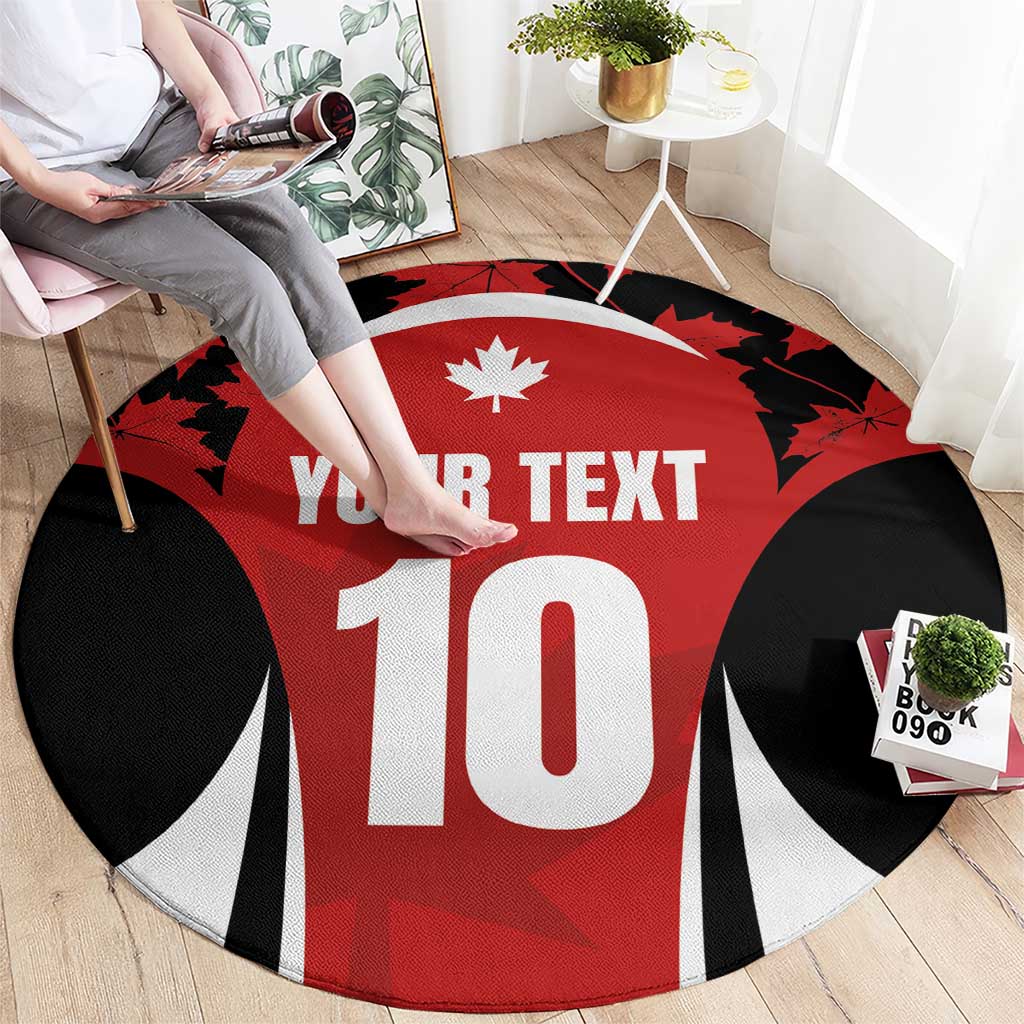Round rugby jersey rug on floor, red with maple leaf, 'YOUR TEXT' and large 10