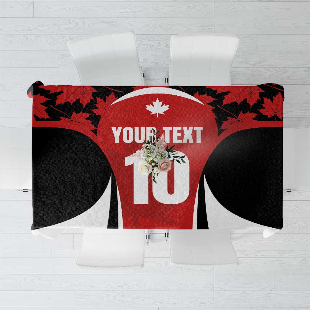 Red, black and white tablecloth with maple leaf pattern and customizable text panel