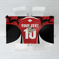Red, black and white tablecloth with maple leaf pattern and customizable text panel