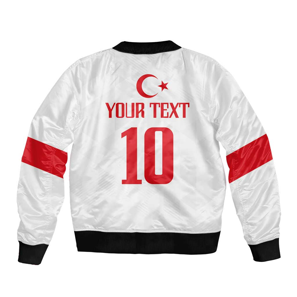 White bomber jacket with red Turkey star and number 10 back graphic, ribbed black trim.
