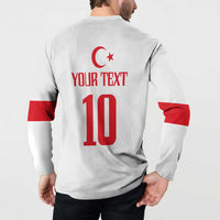 White back quarter-zip sweatshirt with red crescent emblem, 'YOUR TEXT' and number 10