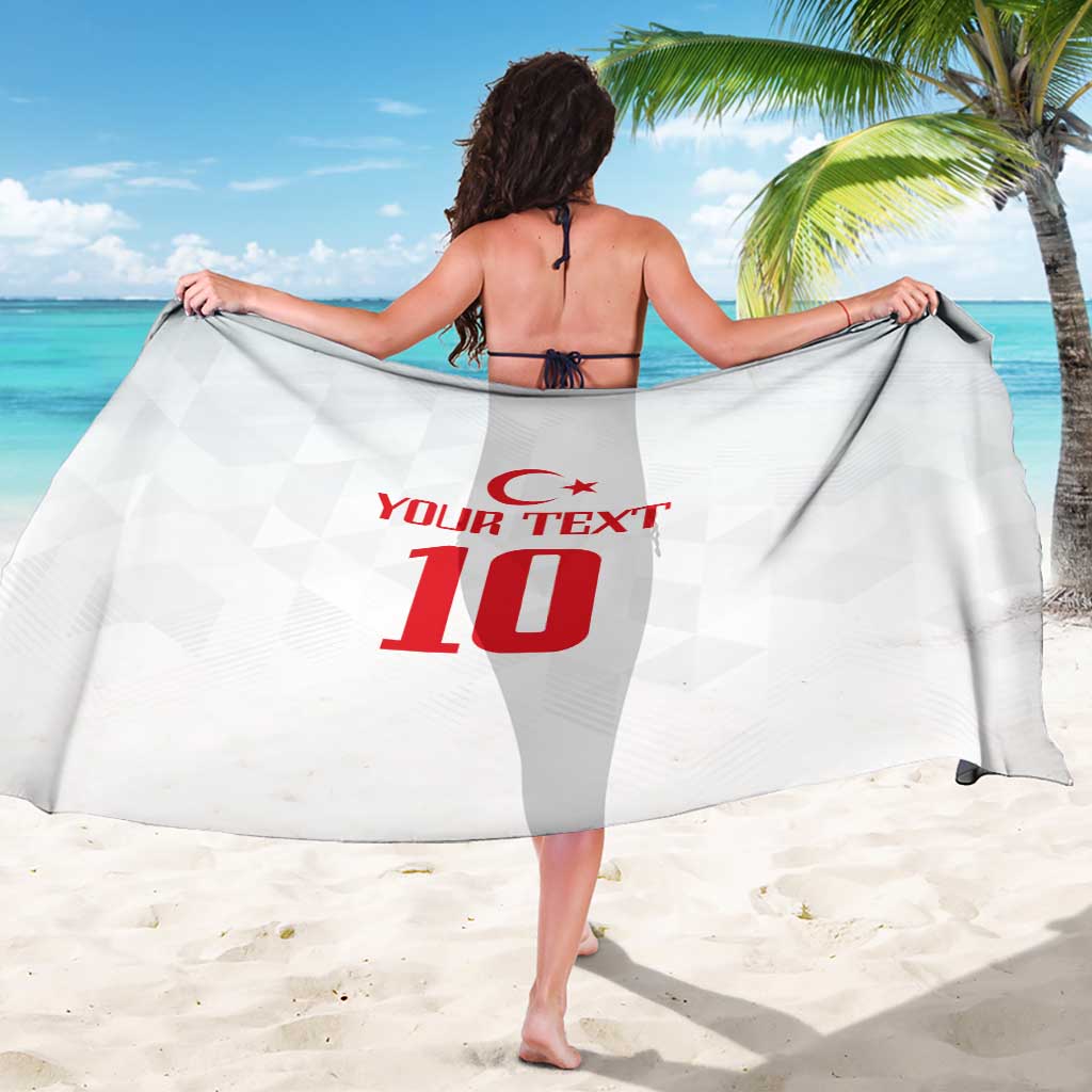 White sarong with 'YOUR TEXT 10' red print, draped across waist from back view