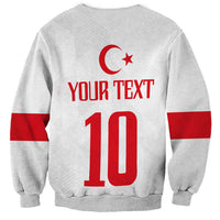 White unisex sweatshirt back with red crescent-star and large '10' text